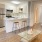 folding doors in living room open to reveal bedroom