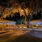 wide-shot of lighted grilling platform at night
